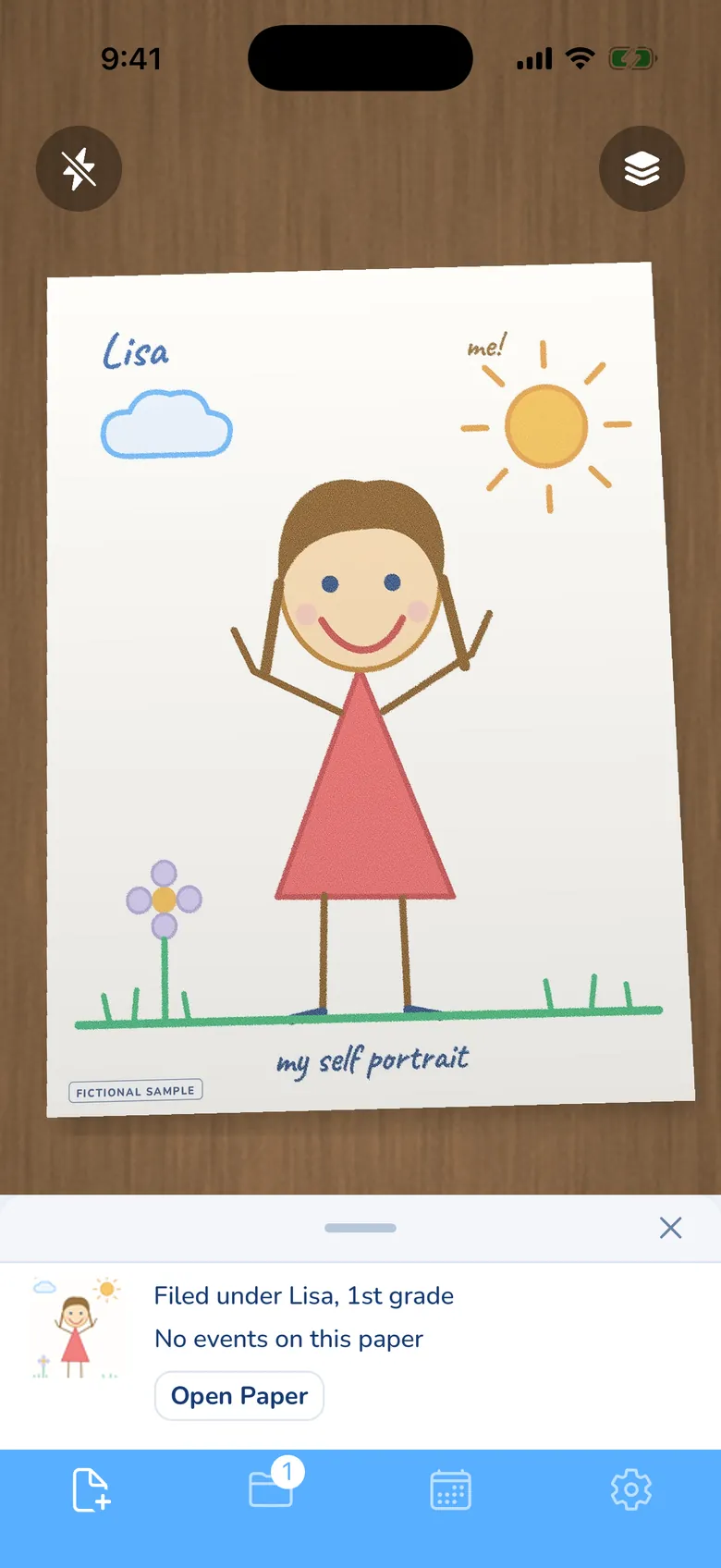 The KidsFoldr camera with a child's crayon self-portrait on a desk in the viewfinder: a smiling girl in a red dress, a sun, a cloud and a flower, with the name Lisa written at the top and a FICTIONAL SAMPLE mark. The receipt below it reads "Filed under Lisa, 1st grade" and "No events on this paper", with an Open Paper button.