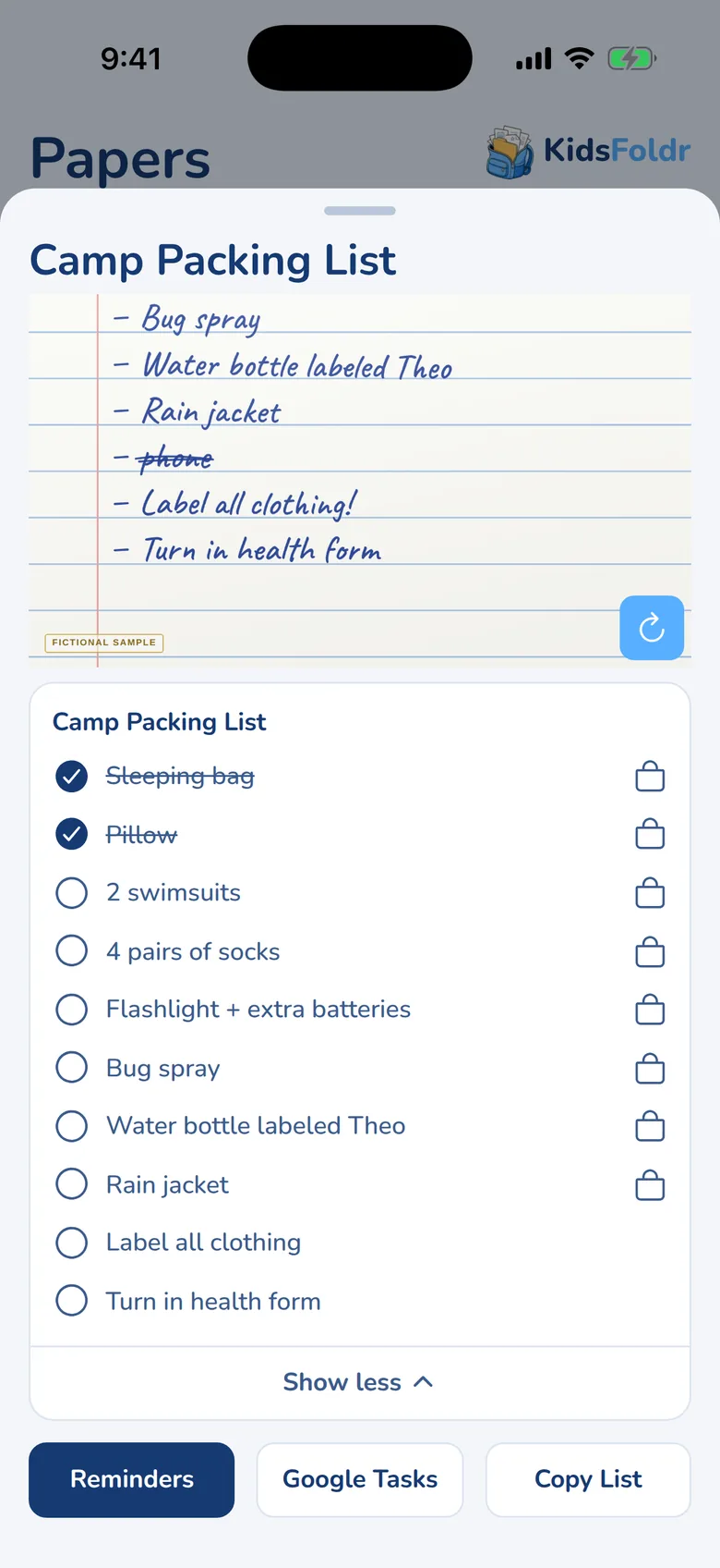 A camp packing list in the KidsFoldr app. Under the handwritten paper, the list card shows ten items with round checks, Sleeping bag and Pillow checked off. Eight items you can buy have a shopping bag button; Label all clothing and Turn in health form do not. Below are Reminders, Google Tasks and Copy List buttons.